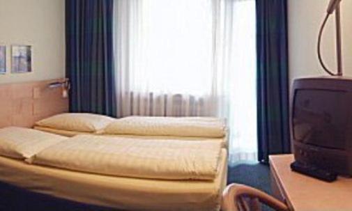 Hotel Konigswache Мюнхен Стая снимка